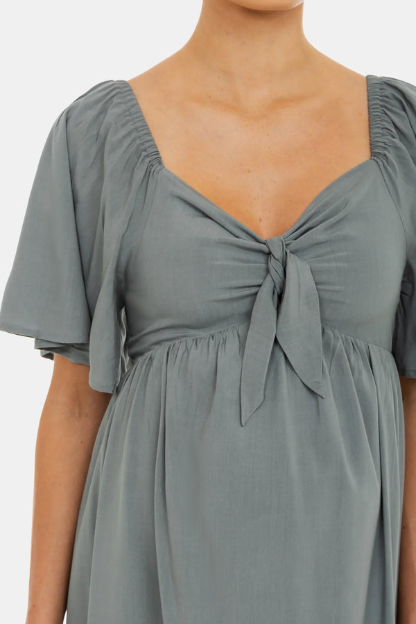 Sommerliches Umstandskleid mit elastischem Rücken und Schleife – Pastellgrün