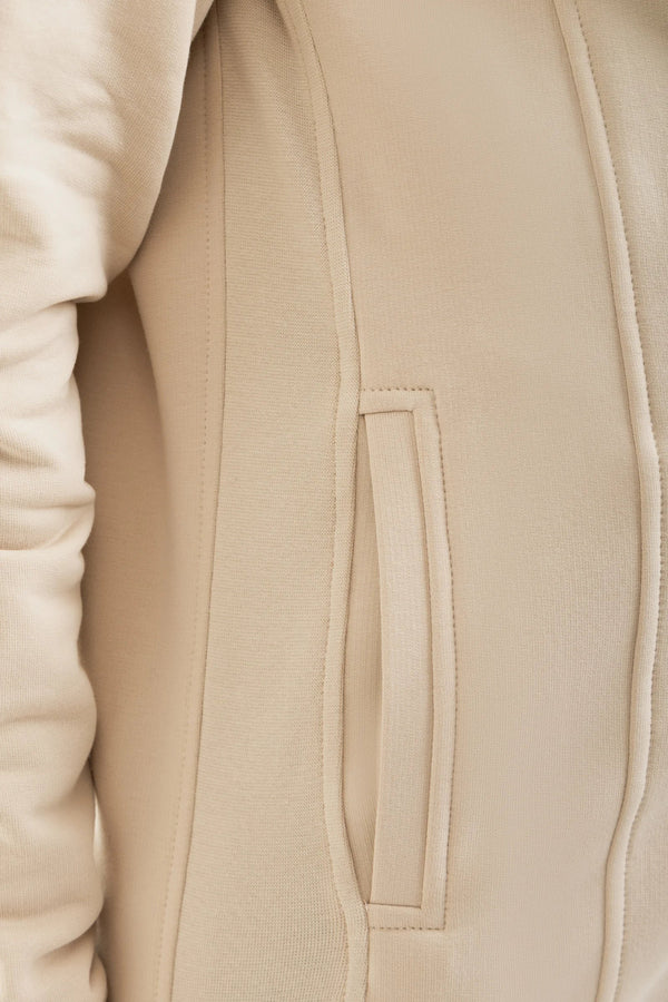 3-in-1 Umstands- und Tragehoodie – Beige