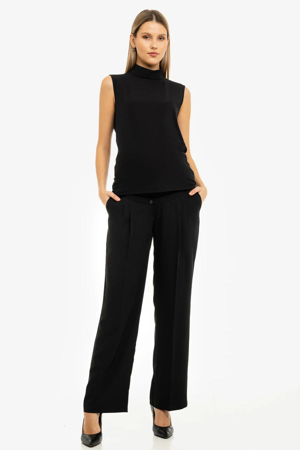 Weite Umstandshose aus Crêpe mit Falten – Schwarz